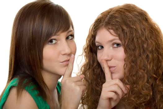 Two teenage girls with gestures calming