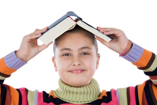 Adorable girl with a book on the head