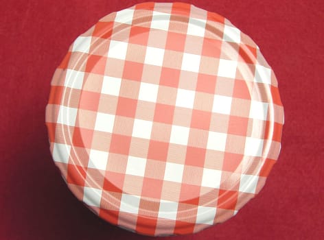 Checkered lid for jars with red background