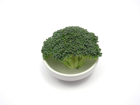 Broccoli in a small porcelain bowl