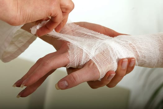 Apply bandage on hand