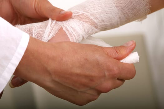 Apply bandage on hand
