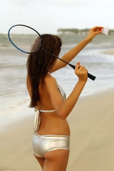 Woman playing badminton