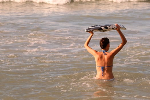 Surfing in the ocean