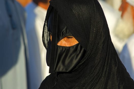 Omani woman with traditional burqa mask,Oman