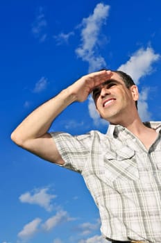 Happy man looking into distance