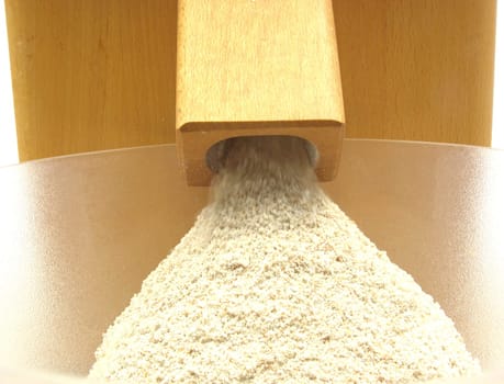 Watching the work of a flour mill