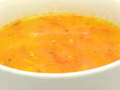 Close-up of a carrot soup with millet