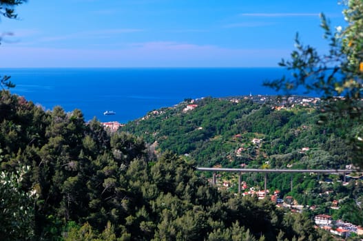 View of the Mediterranean Sea near Menton,on the right motorway viaduct of the A8 motorway,lake