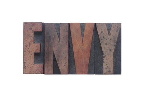 envy in old ink-stained wood type