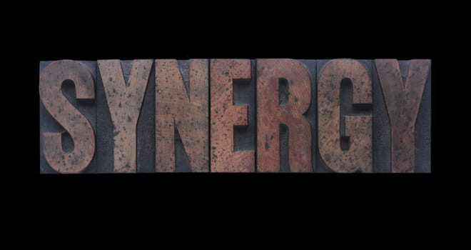 synergy in old ink-stained wood type