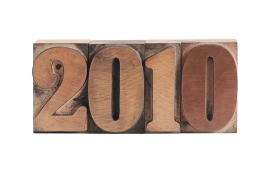 2010 in old ink-stained wood type