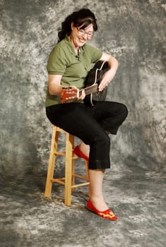 Woman with guitar.