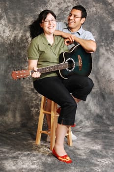 Woman with guitar.