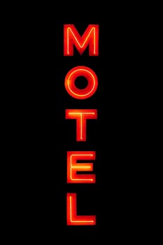 Motel neon sign isolated on black