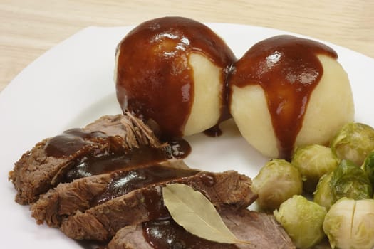 Roast beef with dumplings