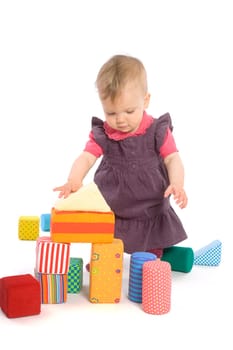 Baby palying with toy blocks
