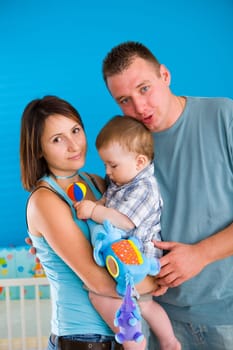 Portrait of happy family at home