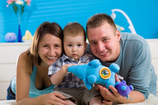 Portrait of happy family at home