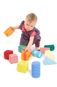 Baby palying with toy blocks
