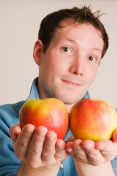 Man Offer Two Apples