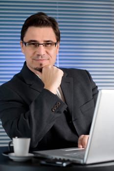 Businessman drinking coffee