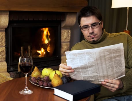 At home by the fireplace