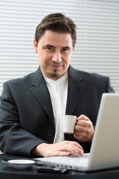 Businessman drinking coffee