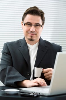 Businessman drinking coffee