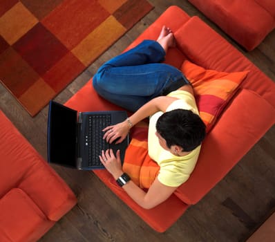 Young woman is using a laptop