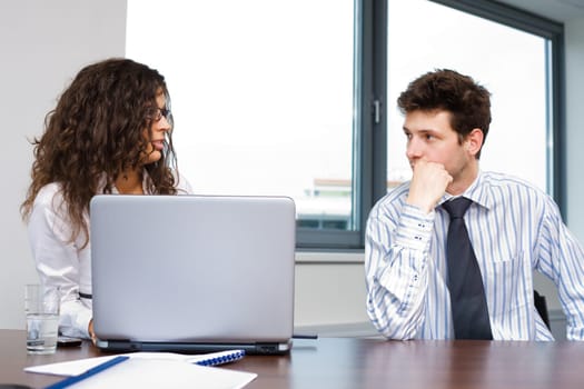 Businesspeople working at office
