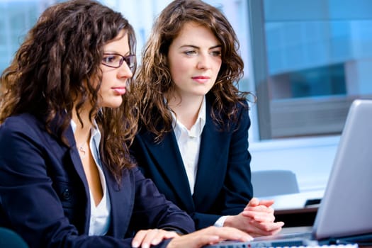 Businesswomen working on computer