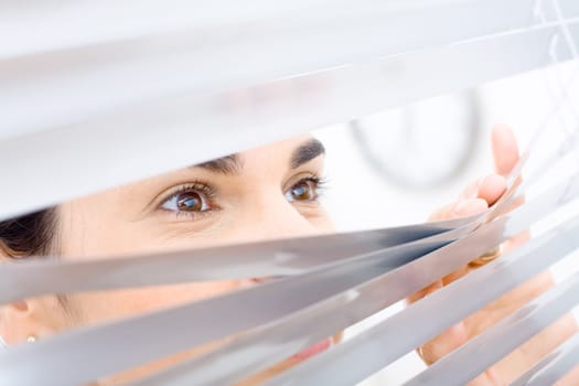 Woman peeping though window