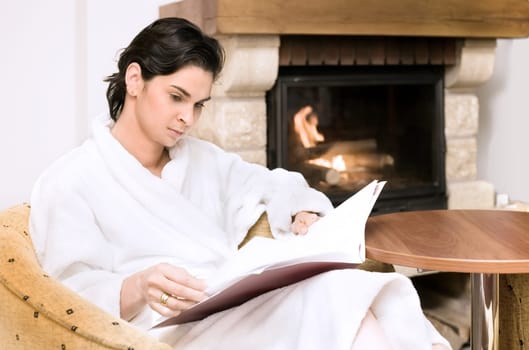 At home by the fireplace