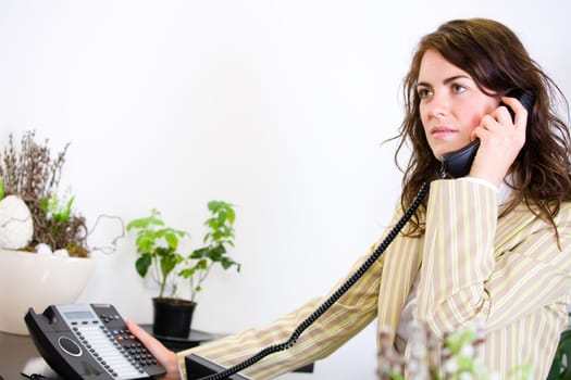 Businesswoman calling on phone