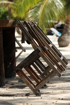 Table and chairs on the beach