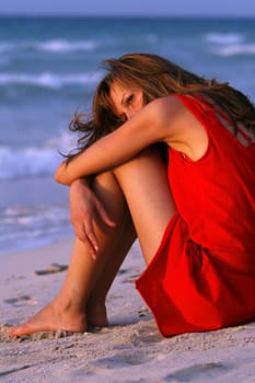 Sad woman at the beach