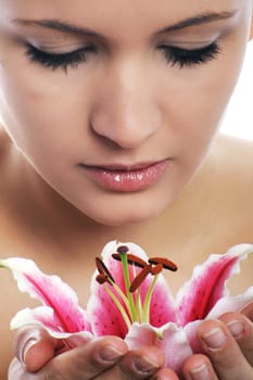 Beauty portrait of a woman with flower