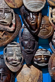 wooden african masks on wall