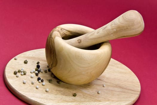 Colorful Peppercorns with Wooden Mortar