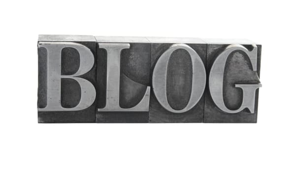 blog in metal type letters
