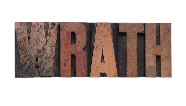 wrath in old ink-stained wood
