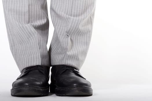 Men's feet in shoes