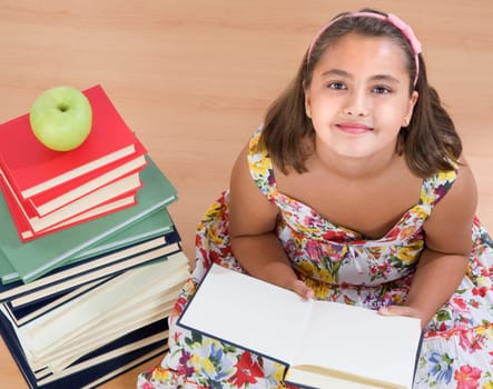 Adorable girl reading
