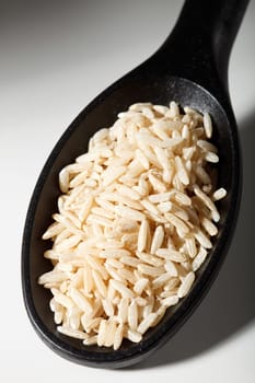 Brown rice on spoon shade