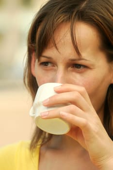 Woman drinking coffee