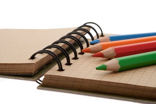 Notepad with crayons
