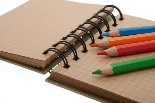 Notepad with crayons