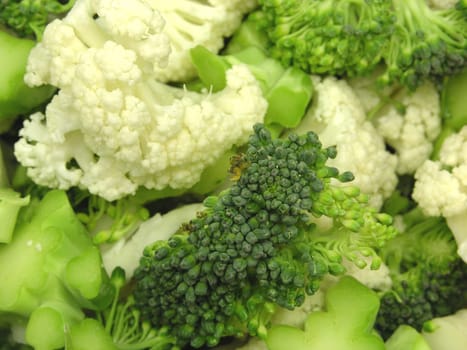 Cauliflower and broccoli mixed as background