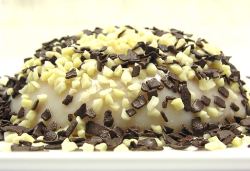 Almond pudding,almond pieces and chocolate sprinkles